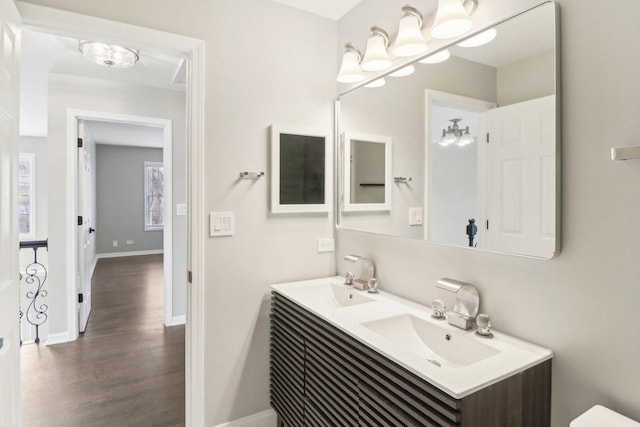 bathroom featuring hardwood / wood-style flooring and vanity