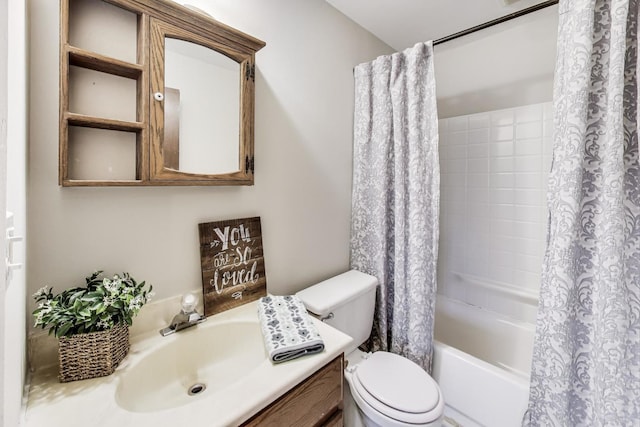 full bathroom featuring shower / tub combo, vanity, and toilet