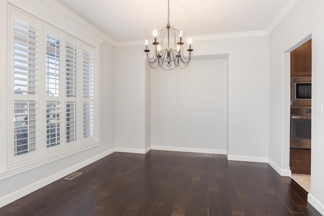 unfurnished dining area with baseboards, visible vents, ornamental molding, dark wood-type flooring, and a notable chandelier