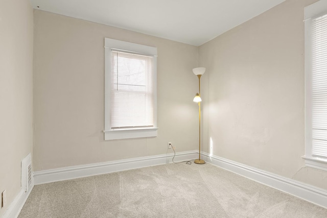 view of carpeted spare room