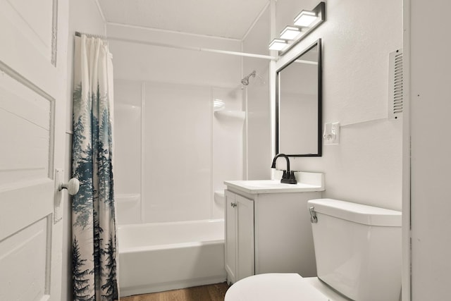 full bathroom featuring vanity, wood-type flooring, toilet, and shower / bath combo with shower curtain