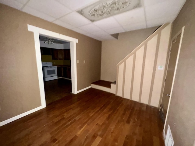 911 S Peoria Ave, Dixon, IL 61021 - basement with visible vents, wood finished floors, and a drop ceiling
