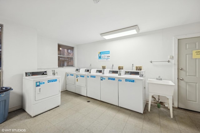 clothes washing area featuring washing machine and dryer