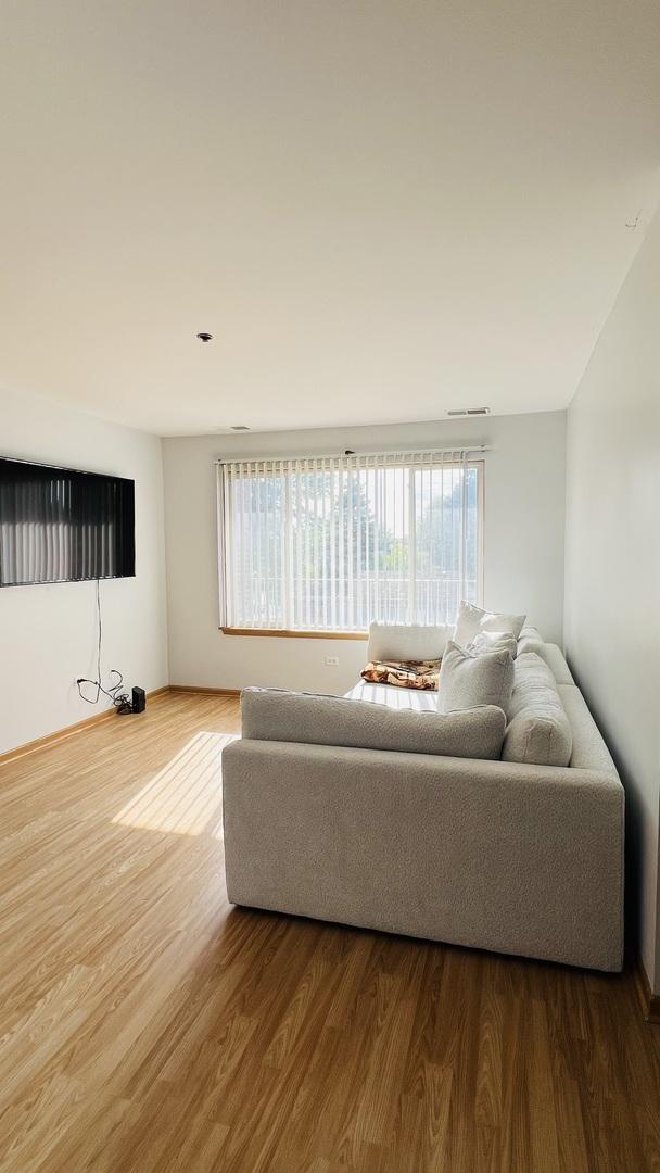 living room with hardwood / wood-style floors