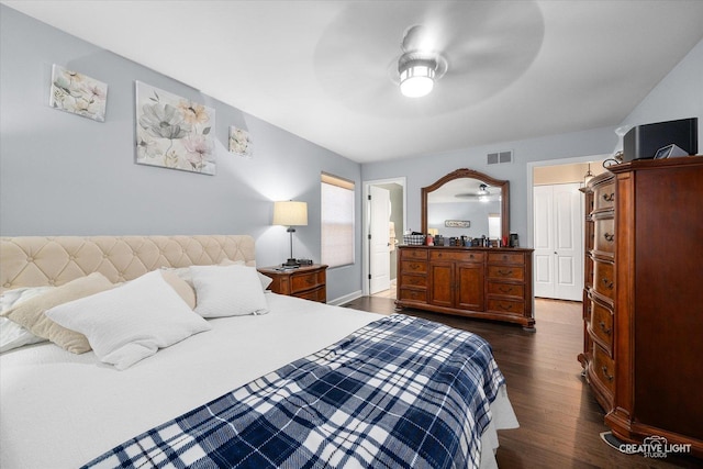 bedroom featuring ceiling fan and dark hardwood / wood-style floors