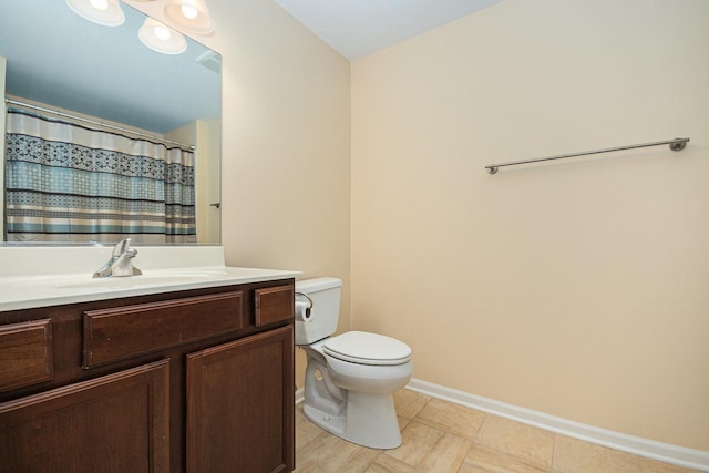 bathroom featuring vanity, a shower with curtain, and toilet