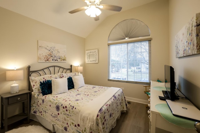 bedroom featuring lofted ceiling, wood-type flooring, and ceiling fan