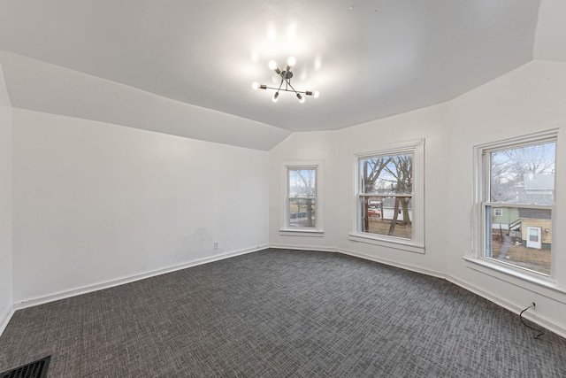 480 E Birch St, Kankakee, IL 60901 - bonus room with a chandelier, dark colored carpet, and lofted ceiling