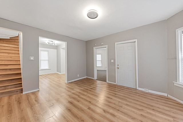 entryway with light hardwood / wood-style flooring