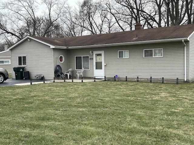 16302 Trumbull Ave, Markham, IL 60428 - view of front facade featuring a patio area and a front lawn