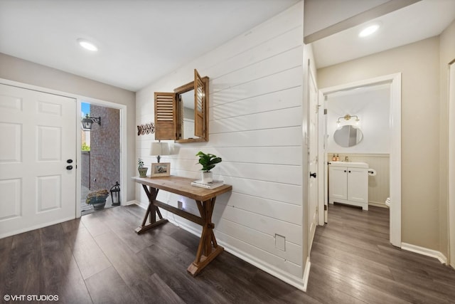 entrance foyer with dark hardwood / wood-style floors