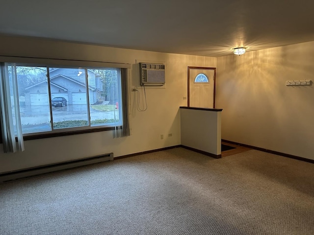 carpeted empty room with baseboard heating and a wall mounted AC