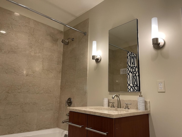 bathroom featuring vanity and shower / tub combo