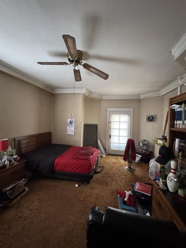 carpeted bedroom featuring a ceiling fan and crown molding