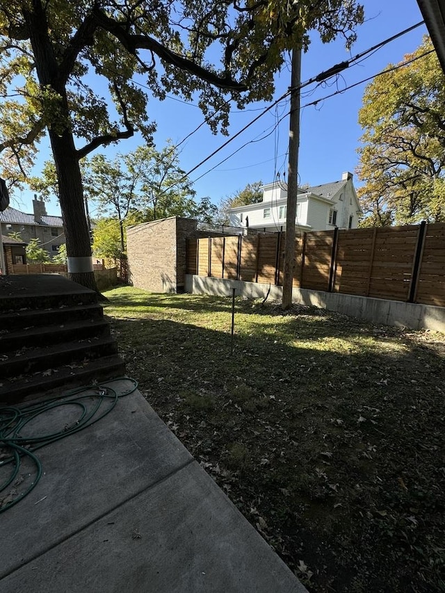 view of yard featuring fence