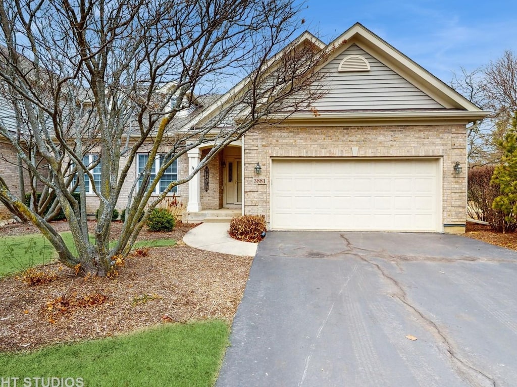 single story home featuring a garage