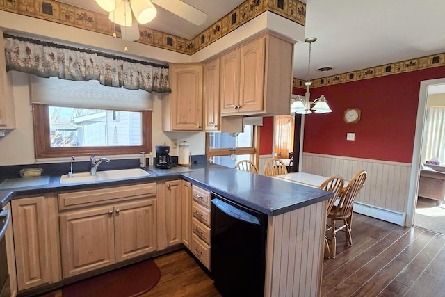 kitchen featuring sink, baseboard heating, dark hardwood / wood-style floors, dishwasher, and kitchen peninsula