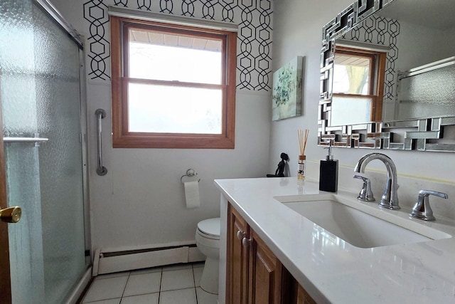 bathroom featuring toilet, an enclosed shower, vanity, tile patterned flooring, and a baseboard heating unit