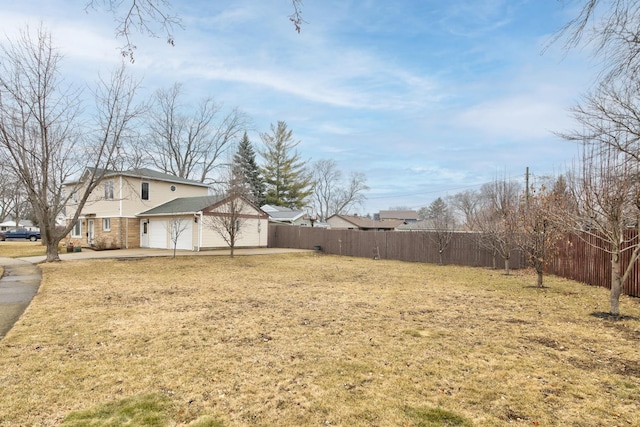 view of yard featuring a garage