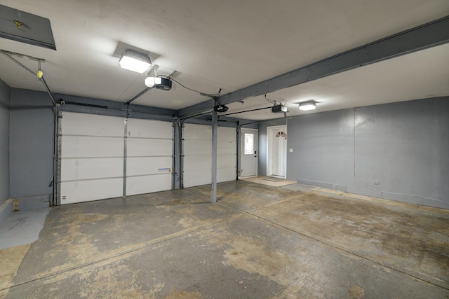 garage featuring a garage door opener