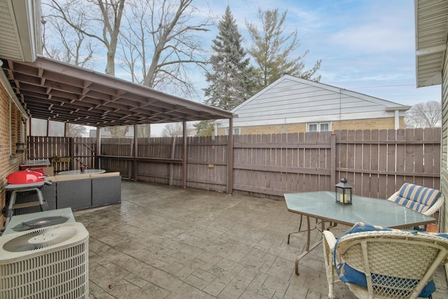 view of patio / terrace featuring an outdoor living space and central air condition unit