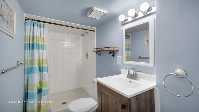 bathroom featuring walk in shower, vanity, and toilet