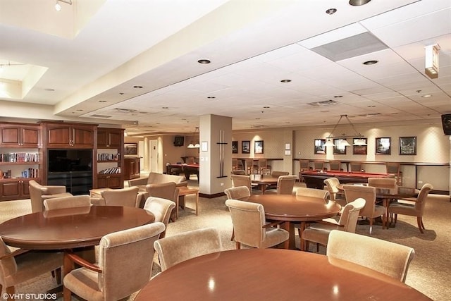 view of carpeted dining area