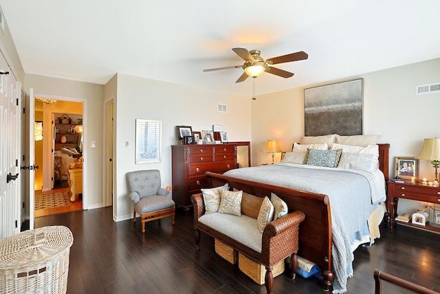 bedroom with dark wood-type flooring and ceiling fan