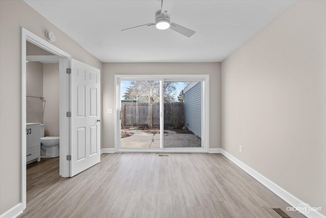 unfurnished bedroom with access to outside, ceiling fan, and light hardwood / wood-style flooring