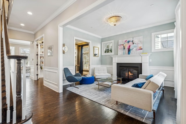 living room with crown molding and dark hardwood / wood-style flooring