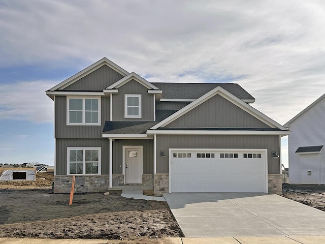 craftsman house with a garage