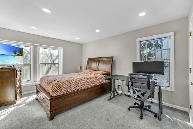 bedroom featuring recessed lighting, baseboards, and carpet