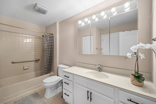 full bathroom featuring tile patterned floors, toilet, vanity, and shower / bath combo with shower curtain