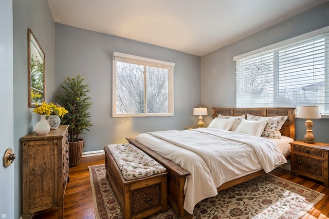 bedroom featuring dark hardwood / wood-style floors