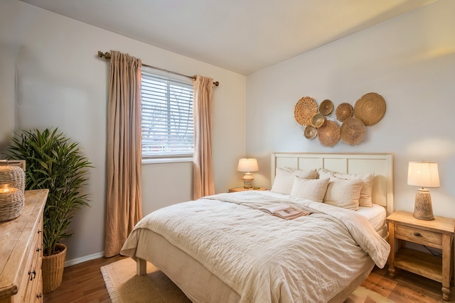 bedroom featuring dark hardwood / wood-style floors