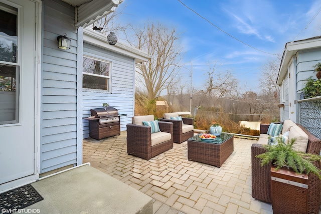 view of patio / terrace with area for grilling and an outdoor living space