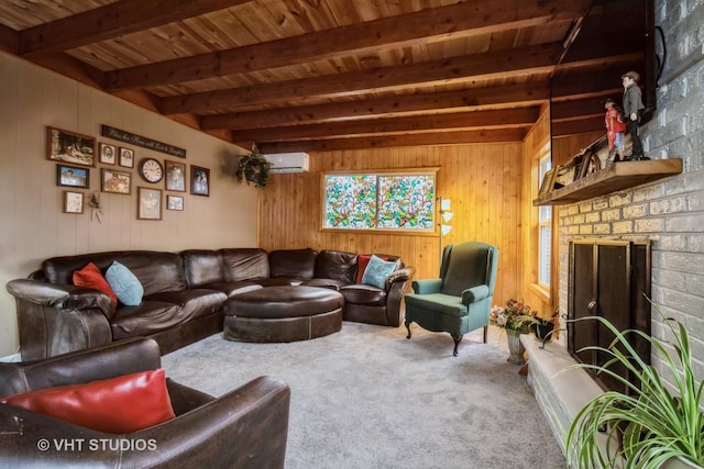 living room featuring wood ceiling, a brick fireplace, a wall unit AC, beam ceiling, and carpet