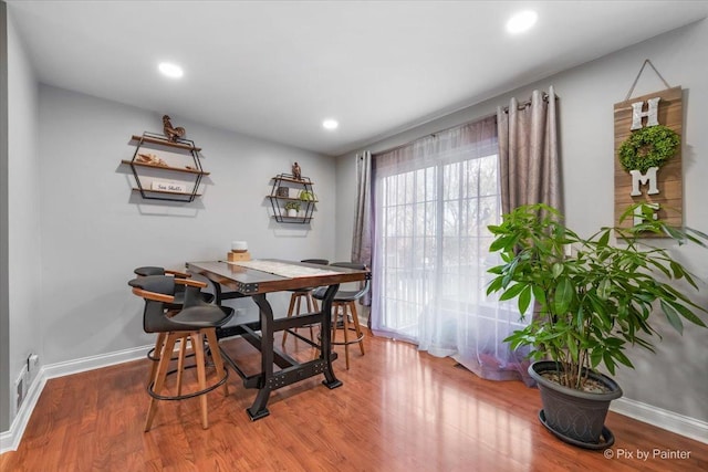 dining area featuring hardwood / wood-style flooring