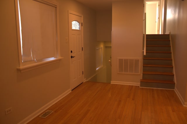 foyer with light hardwood / wood-style flooring