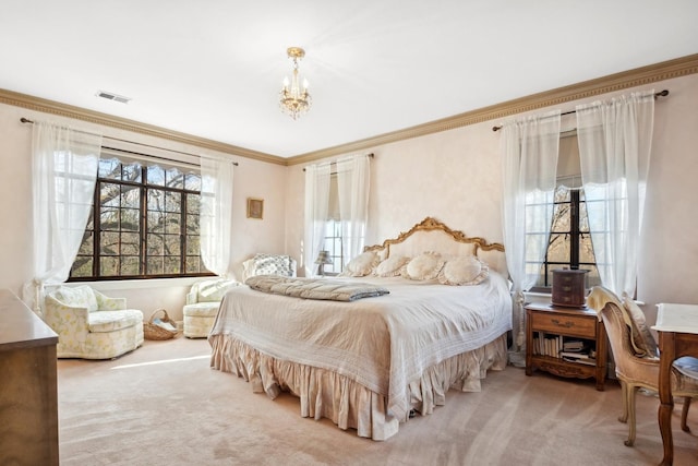 carpeted bedroom with an inviting chandelier and crown molding