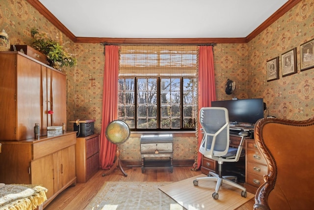 home office with ornamental molding and light hardwood / wood-style floors