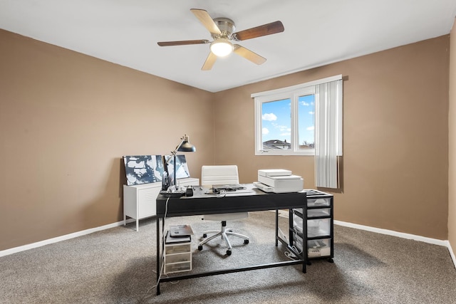 office space with carpet floors and ceiling fan