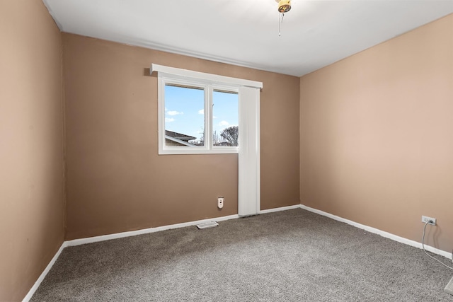 view of carpeted spare room