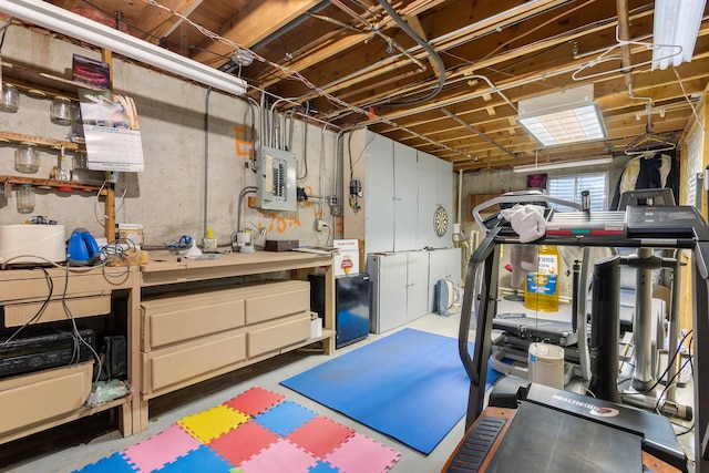 workout room featuring electric panel