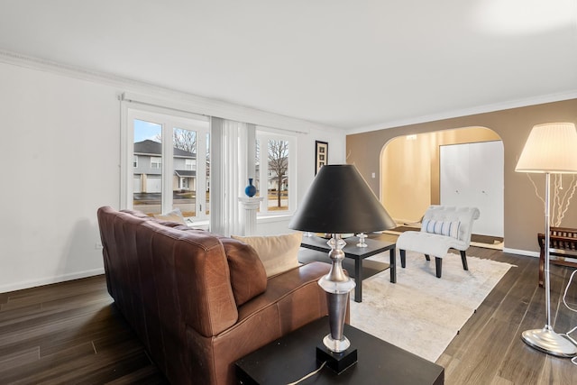 living room featuring crown molding and dark hardwood / wood-style flooring