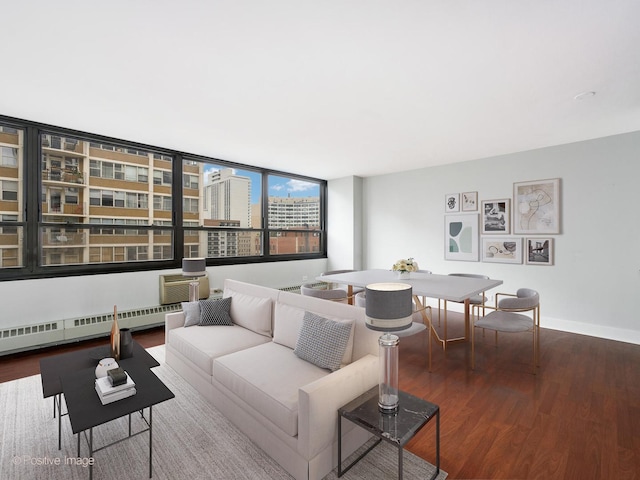 living room with radiator heating unit, a wall mounted AC, and hardwood / wood-style floors