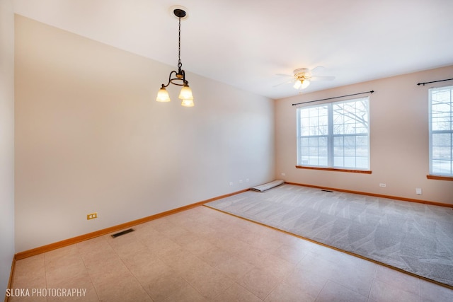 spare room featuring ceiling fan