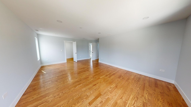 unfurnished room featuring light wood-type flooring