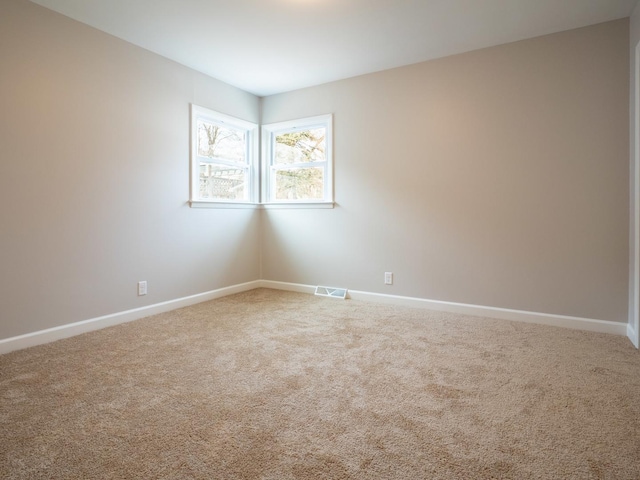 view of carpeted spare room