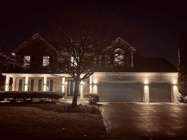 view of front of property featuring a garage